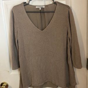 Quarter sleeve sweater with sheer back